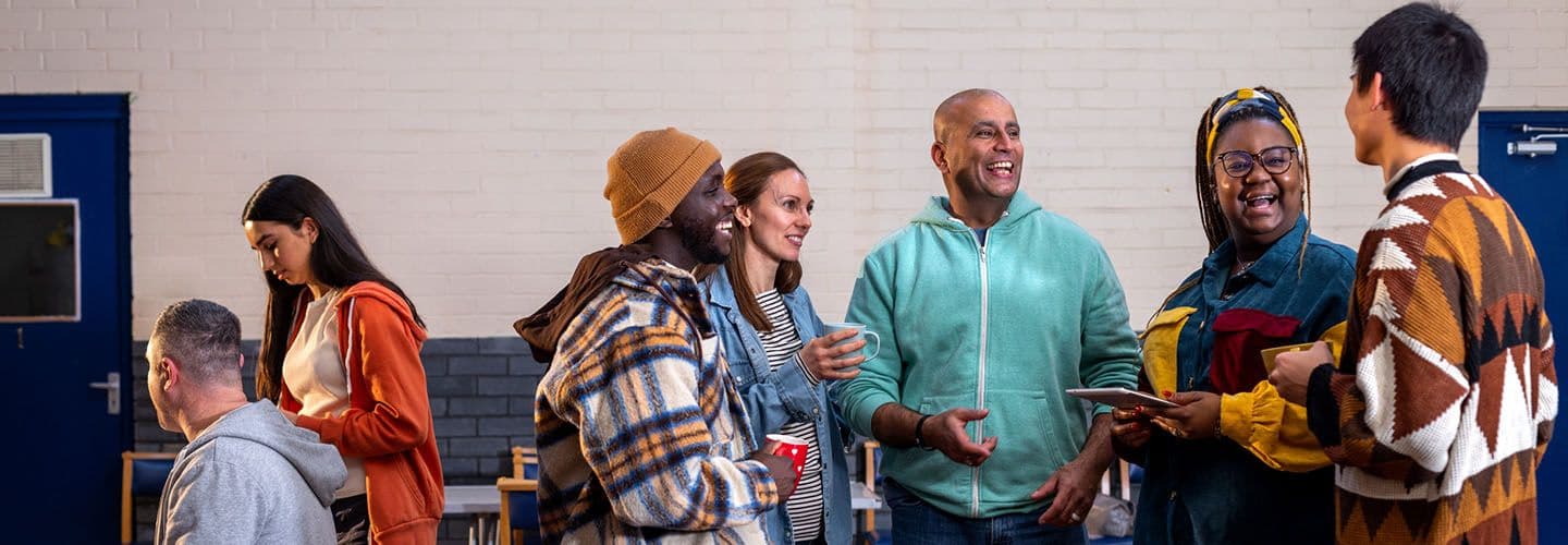 A group talk together at the Community Center
