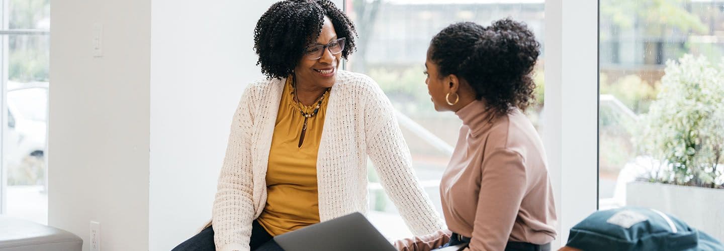 a teacher mentoring a student