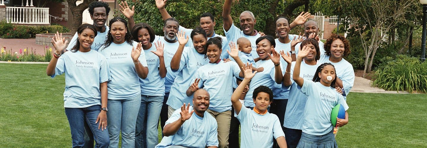 a family waves at the camera at a family reunion
