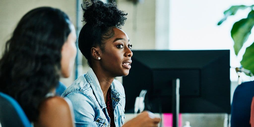 a young woman in a discussion group