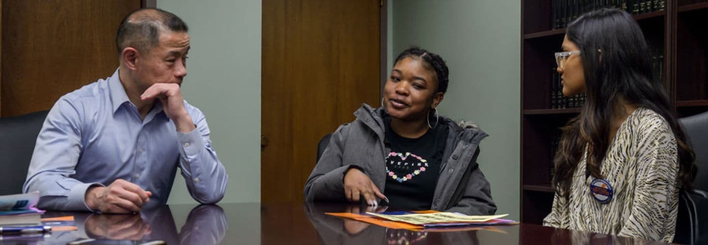 a state senator talks to college students
