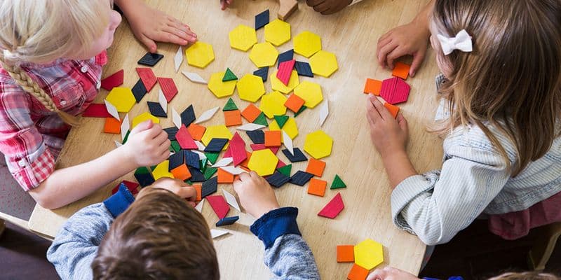 preschool children play with shapes