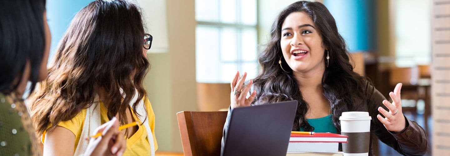 young women study together